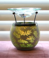 Photo of our gorgeous Asian-Inspired green leaf aroma lamp that uses a tealight candle